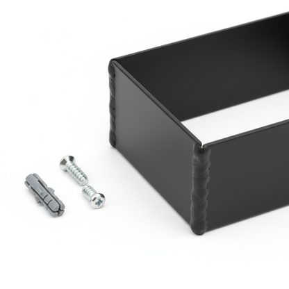 Close-up of metal frame joints and included mounting screws on white background